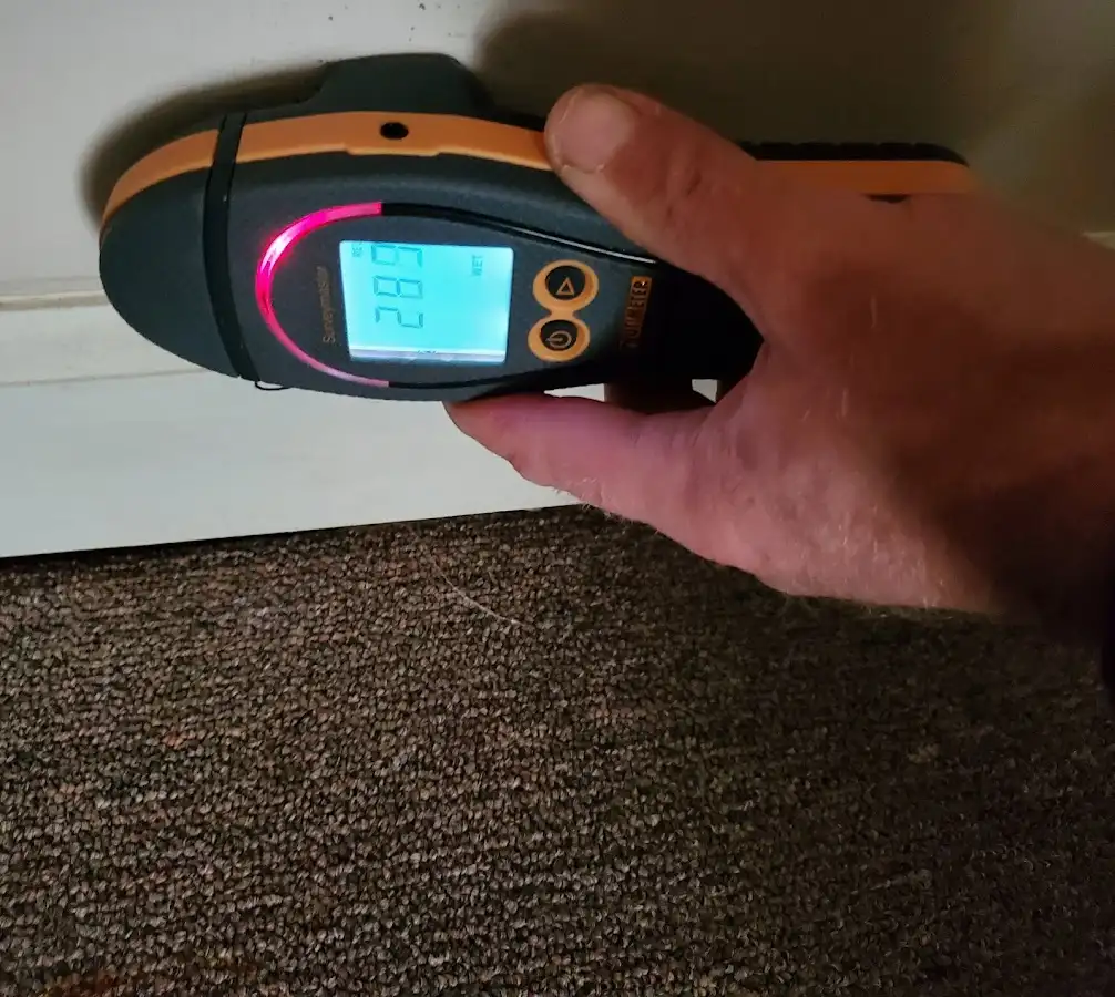 Moisture detection at baseboard during Burst Pipe Cleanup in Middletown